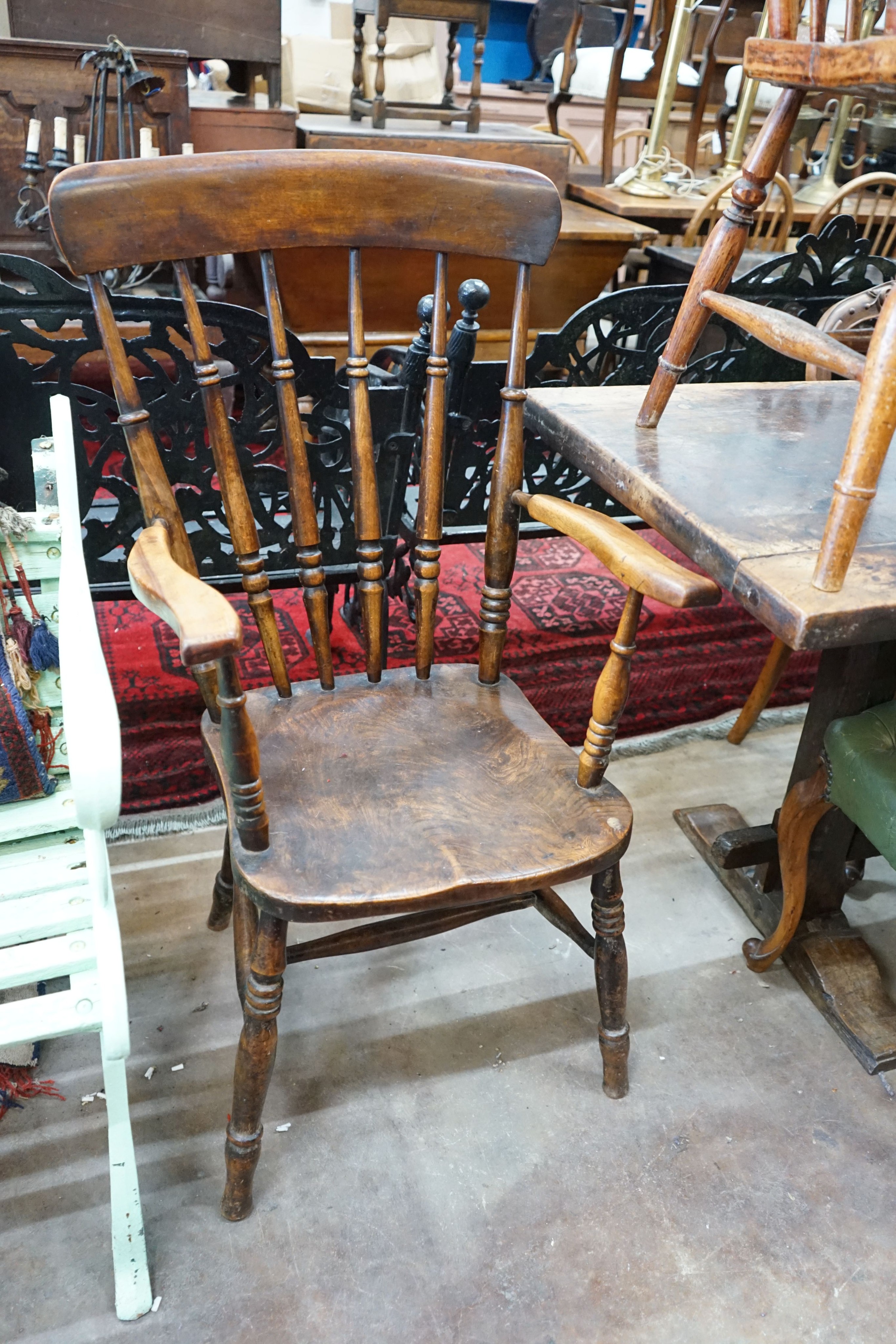 Five Victorian elm, ash and beech Windsor lathe and comb back elbow chairs